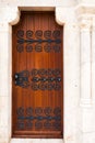 Wooden doors with wrought iron elements Royalty Free Stock Photo