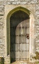 Old wooden doorway to church in England