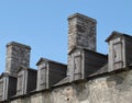 Old wooden dormers on stone building