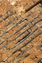 Old wooden earthen wall, background texture