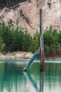 Electric pillar sticking out of water