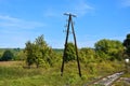 Old wooden electricity pole near railway Royalty Free Stock Photo