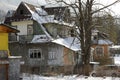 Old wooden family house is partially plastered