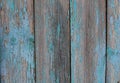 Old wooden fence with blue shabby paint Royalty Free Stock Photo