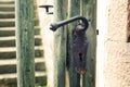 Old wooden fence with door handle Royalty Free Stock Photo