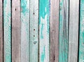 Old wooden fence with faded color. Worn old paint on the fence. Russian vintage. Beautiful old boards. Decor for design style shab