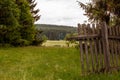 Old wooden fence in forest Royalty Free Stock Photo