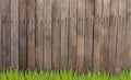 Old wooden fence and grass