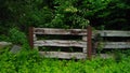 Old Wooden Fence In A Green Forest Royalty Free Stock Photo