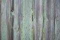 Old wooden fence shabby turquoise paint texture