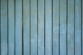 Old wooden fence shabby turquoise paint texture