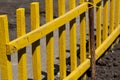 Old wooden fence yellow painted Royalty Free Stock Photo