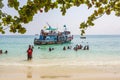 old wooden ferry boat brings tourists to the small island of Koh Samet