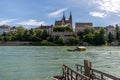 Old wooden ferry boat transfers passengers from Klein Basel to Basel only with the Rhine river current