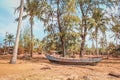 Old wooden fisher boat on land , vintage fisherboat near beach Royalty Free Stock Photo