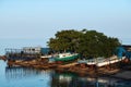 An old wooden fishing boat covered in graffiti on dry dock Royalty Free Stock Photo