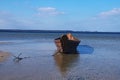 Old wooden fishing boat near the shore Royalty Free Stock Photo