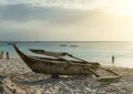 Old wooden fishing boat on Zanzibar beach Royalty Free Stock Photo