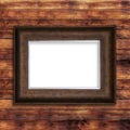 Old wooden frame on wood wall.