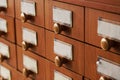 Old wooden furniture drawers from an analog file cabinet, archive or university library. Card file. Vintage storage of information Royalty Free Stock Photo