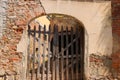 Old wooden gate in an archway Royalty Free Stock Photo