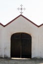 The old wooden gate at the entrance to the church. The open doors of the house of the Lord. The place of worship and prayer of Royalty Free Stock Photo