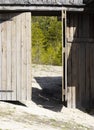 Old wooden gate of the house with large sashes Royalty Free Stock Photo