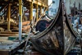 Old wooden gondola on the pier in Venice, Italy