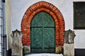 Old wooden green door. The home of the three brothers in Riga. Latvia Royalty Free Stock Photo