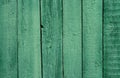 Old wooden green painted fence, beautiful background