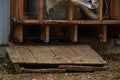 Old wooden hatch to crawlspace damaged Royalty Free Stock Photo