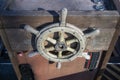 Old wooden helm of a boat