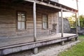 Old wooden home with rocking chair Royalty Free Stock Photo