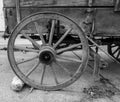 Old wooden horse-drawn wagon wheel and brake section