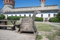 Old wooden horse for punishment in the courtyard of the castle Royalty Free Stock Photo