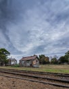 Old wooden house in abandoned train station deep inside south america Royalty Free Stock Photo