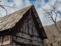 Old wooden house against the sky Krasnaya Polyana Sochi 03 30 2019