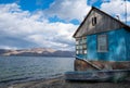 Old wooden house on the banks of Sevan lake in Armenia. Royalty Free Stock Photo