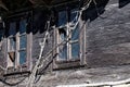 Old wooden house with broken windows Royalty Free Stock Photo