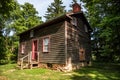 Old wooden house. Historical home. Cabin in forest