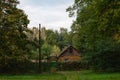 Old wooden house in the middle of the forest Royalty Free Stock Photo