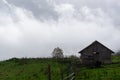 Old wooden house in the mountains. Carpathian mountains. Shepard cottage. Royalty Free Stock Photo