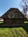 Old wooden house and reed roof Royalty Free Stock Photo