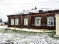 old wooden house on the street of a small Ural city
