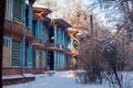 The Old wooden house in winter forest. Royalty Free Stock Photo