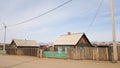 Old wooden houses in the village of Khuzhir on the island of Olkhon. Spring in Siberia on lake Baikal Royalty Free Stock Photo