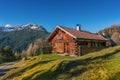 Old wooden hut cabin in mountain alps