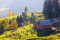 Old wooden hut cabin in mountain at rural fall landscape Royalty Free Stock Photo