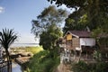 Old wooden hut of monk or Parsonage on cliff riverside mekong river at Wat Hin Maak Peng