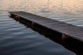 Old wooden jetty amongst ocean surface ripples